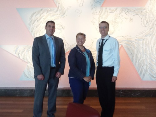 With Glen Toohey and David Atkins at the Australian Government in Canberra. (The artwork depicts the world map from shifting global perspectives).
